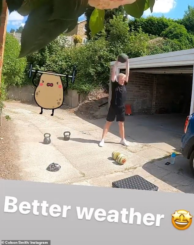 Work out: The actor, 21, who plays Craig Tinker in the ITV soap, looked amazing as he worked up a sweat lifting weights outside his garage