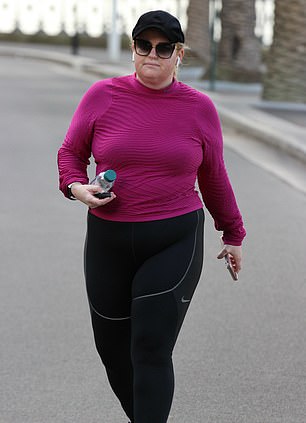 Changes: Rebel was dressed in a long-sleeve top and black Nike tights for the walk