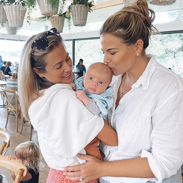 Baby love: Fiona and her fiancée Hayley Willis, who became engaged in 2019, welcomed their first child, Hunter, in March. All pictured
